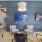 a room with a tv and chairs